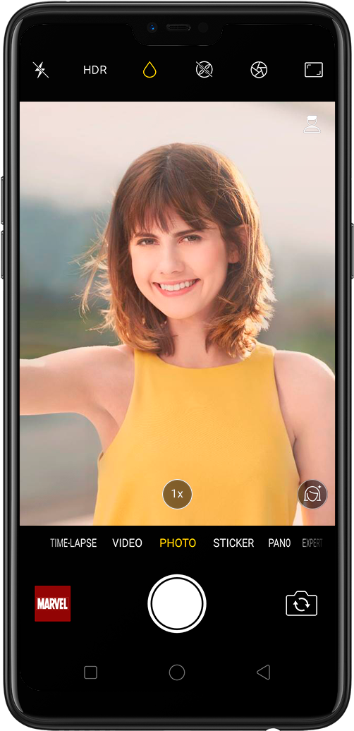 A Woman Smiling On A Cell Phone