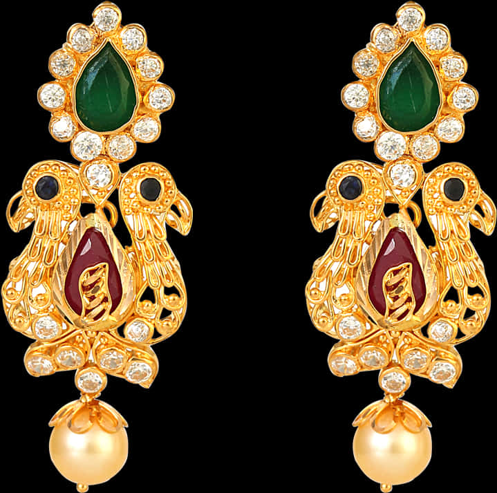 A Pair Of Gold Earrings With Gemstones And Pearls