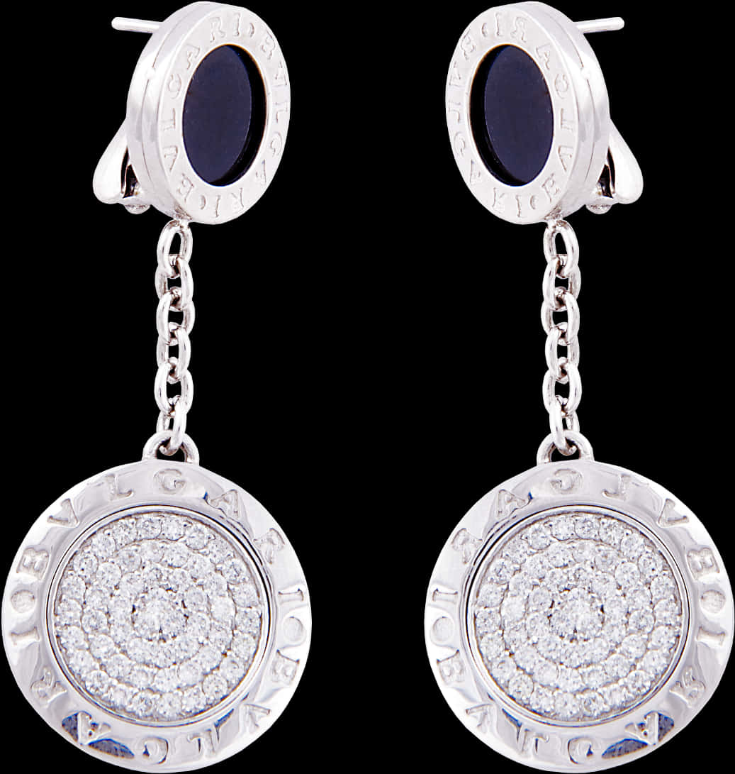 A Pair Of Earrings With Diamonds