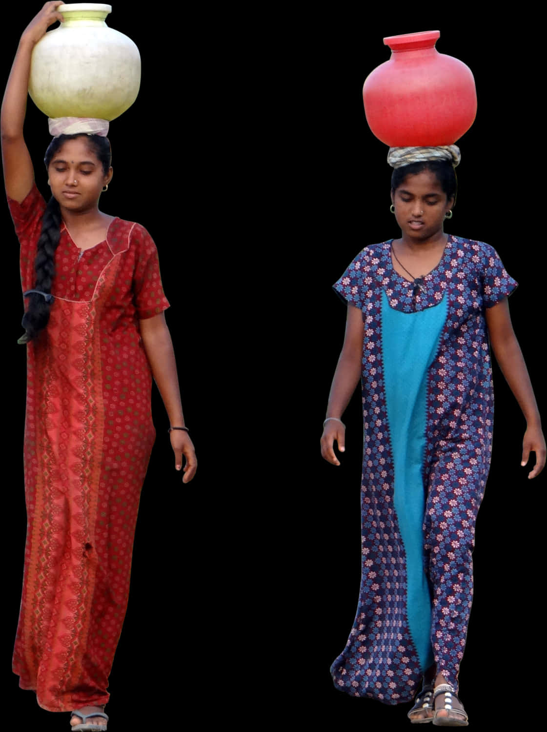 Two Girls In Long Dresses With A Ball On Their Head