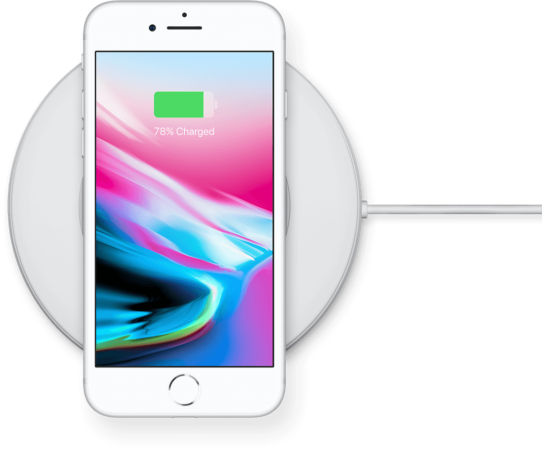 A White Cell Phone On A Wireless Charger