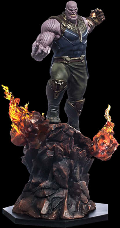 A Statue Of A Man On A Rock With Flames