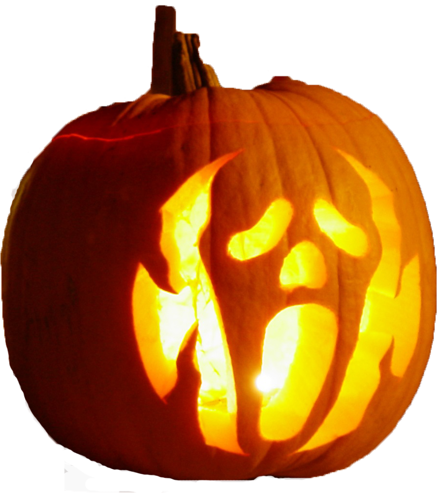 A Carved Pumpkin With A Face And A Candle Inside