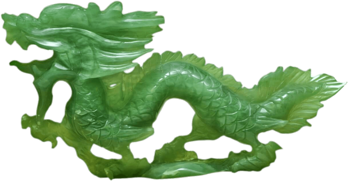 A Green Dragon Statue On A Black Background