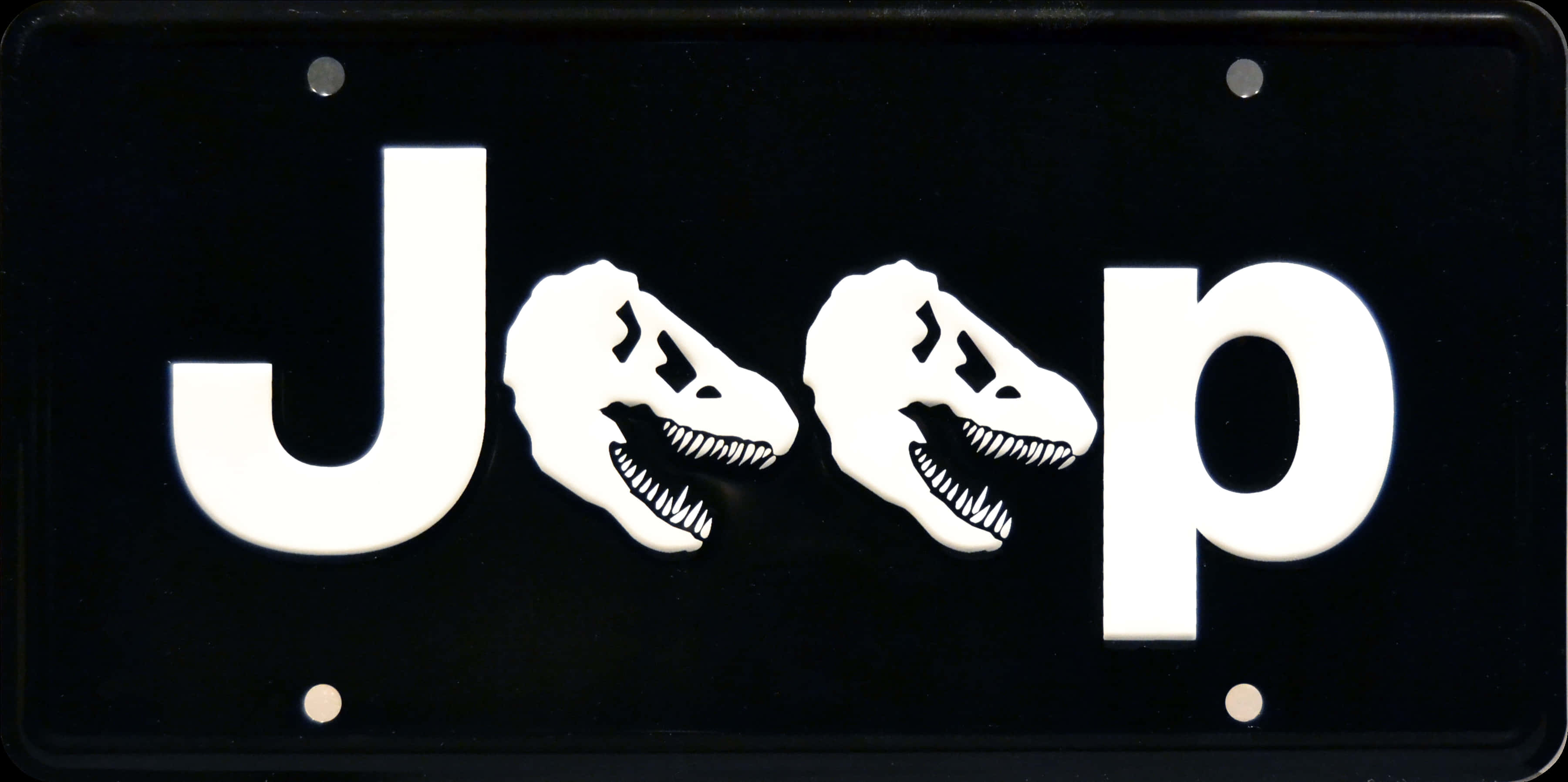 A Black And White Sign With White Dinosaurs