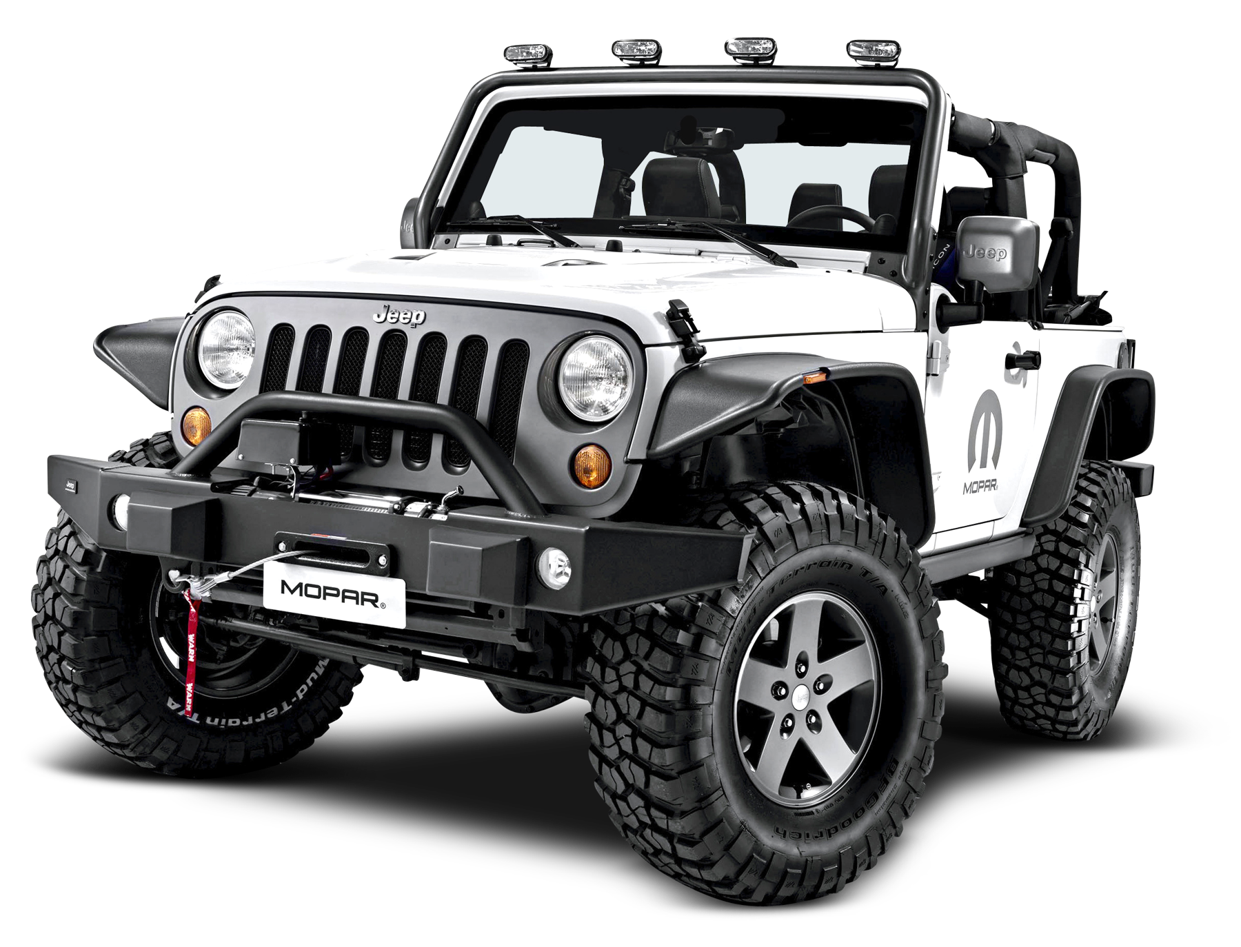 A White Jeep With Large Tires
