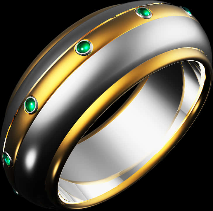 A Silver And Gold Ring With Green Gems