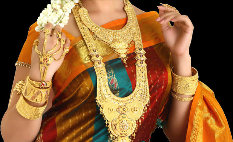 A Woman Wearing A Colorful Dress And Gold Jewelry