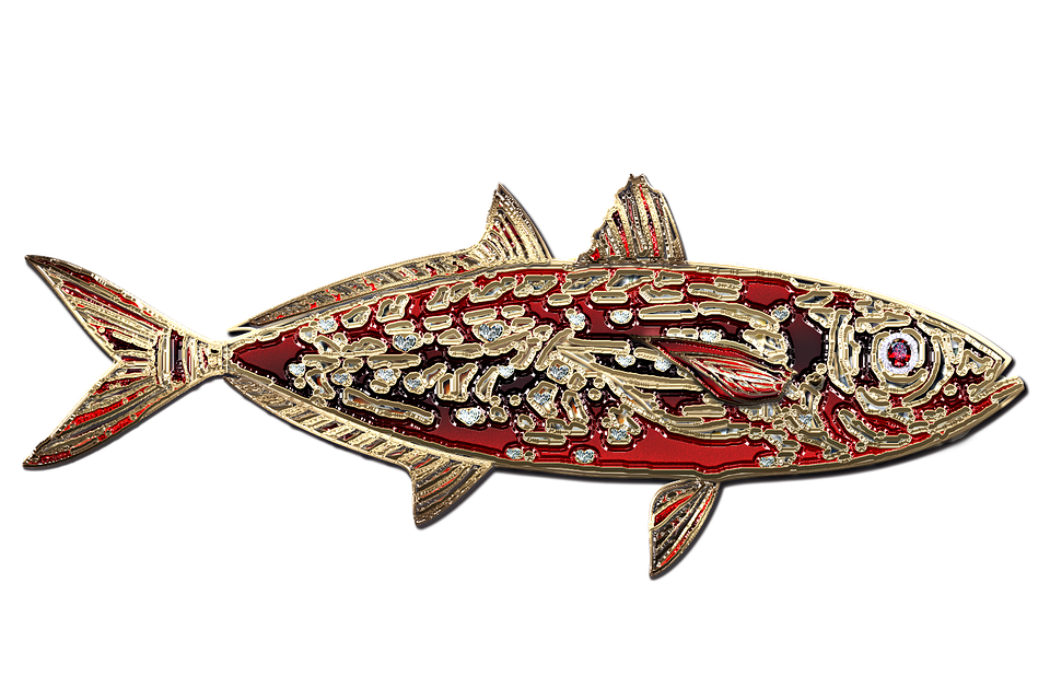 A Gold And Red Fish With Diamonds
