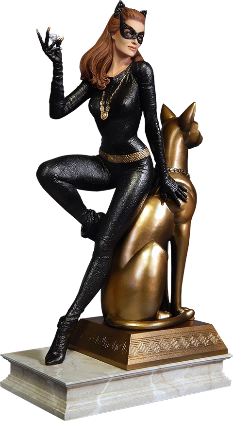 A Statue Of A Woman Sitting On A Gold Cat Statue