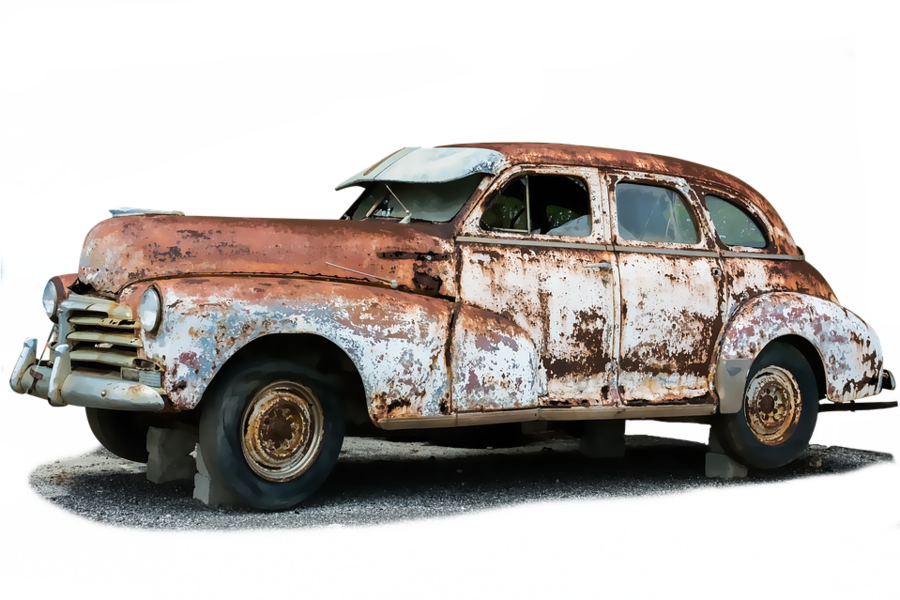 An Old Rusty Car With A Black Background