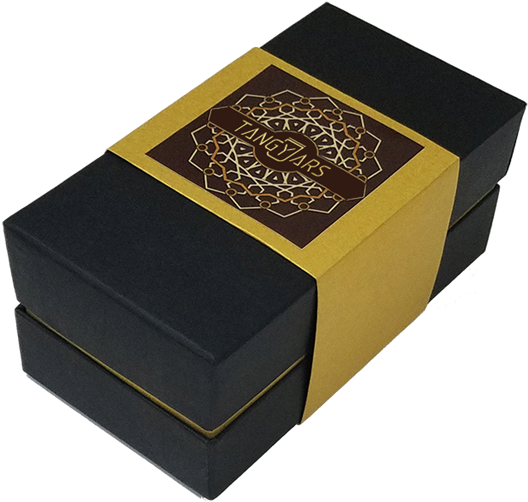 A Black And Gold Box With A Gold Ribbon
