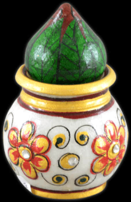 A Round White And Yellow Vase With A Green Object On Top