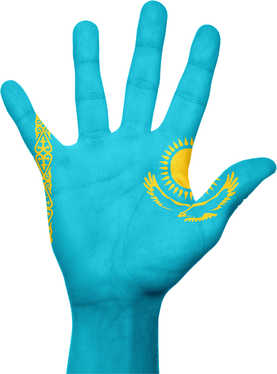 A Hand With A Painted Sun And Eagle