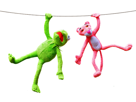 A Green Frog And Pink Panther From A String