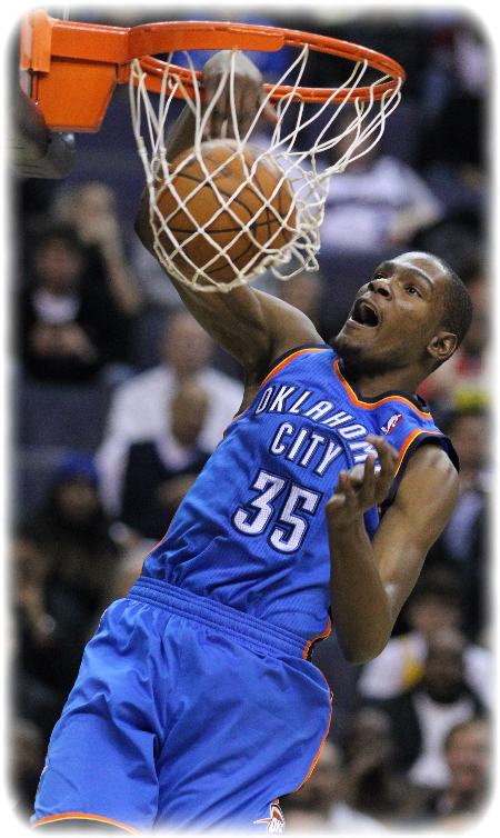 A Man In A Basketball Uniform Dunking A Basketball