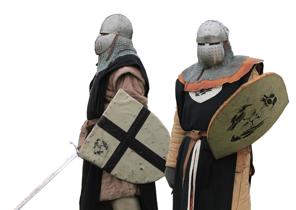 Two People Wearing Armor And Holding Shields