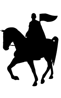 A Silhouette Of A Man Riding A Horse