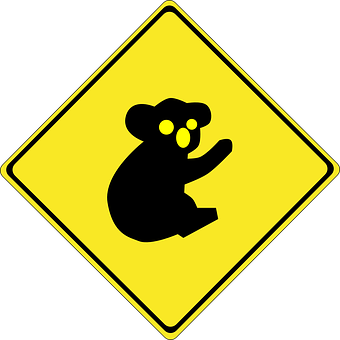 A Yellow Sign With A Koala Bear