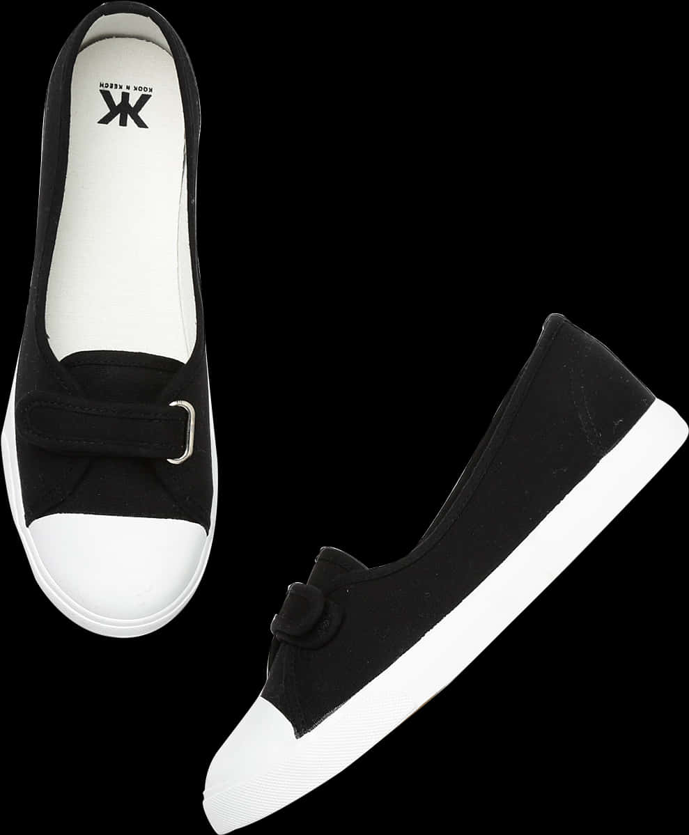 A Pair Of Black And White Shoes