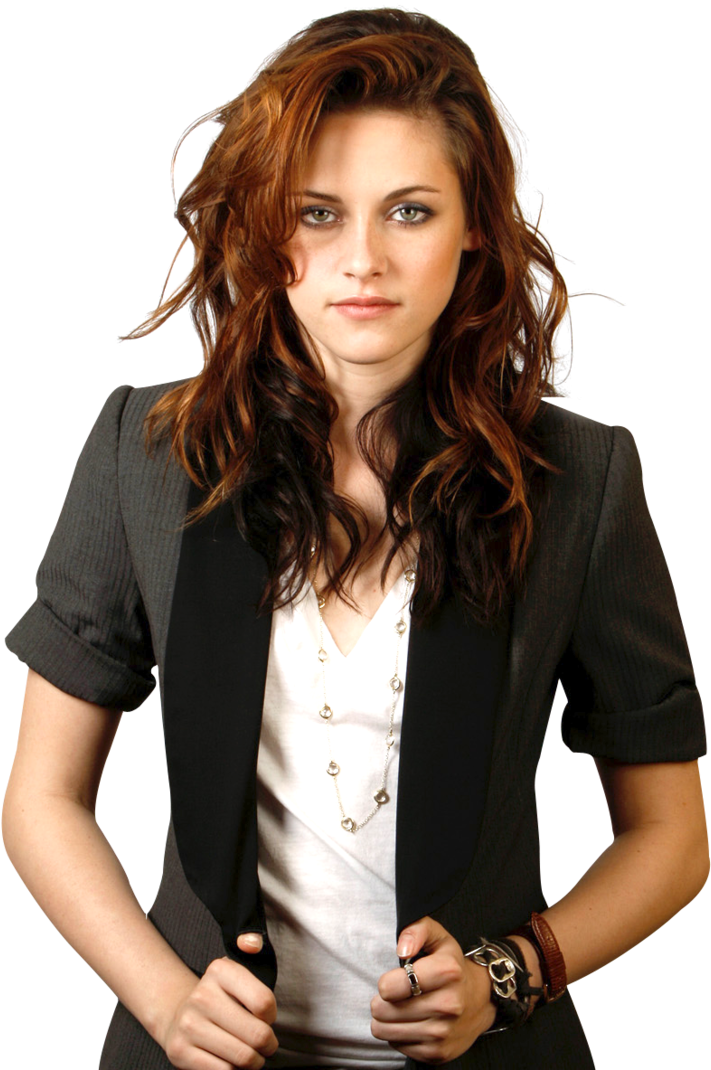A Woman With Long Red Hair Wearing A Black Blazer