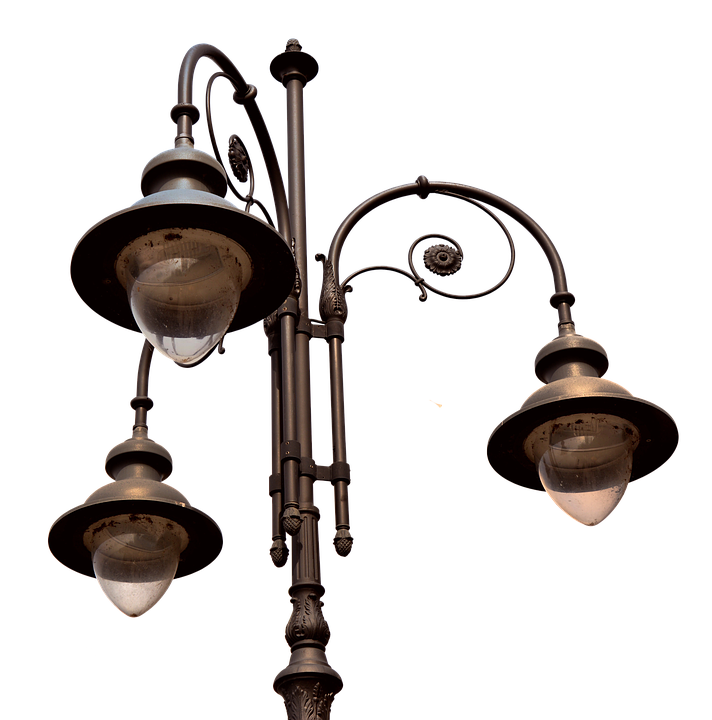 A Lamp Post With Three Lights