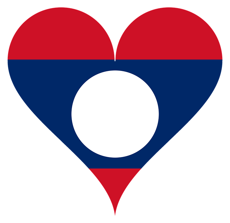 A Heart Shaped Flag With A White Circle In The Middle