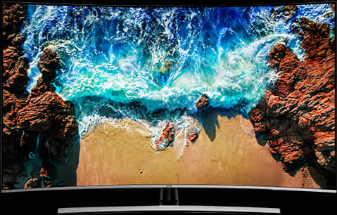 A Television With Waves Crashing On The Beach