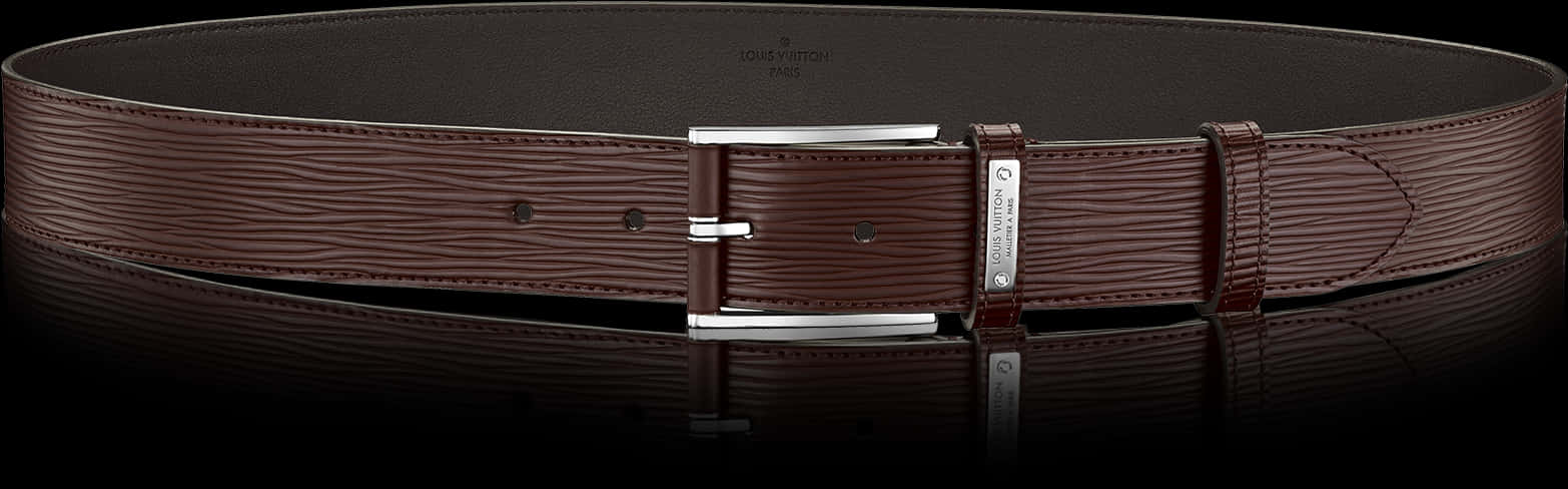 A Brown Belt With A Silver Buckle
