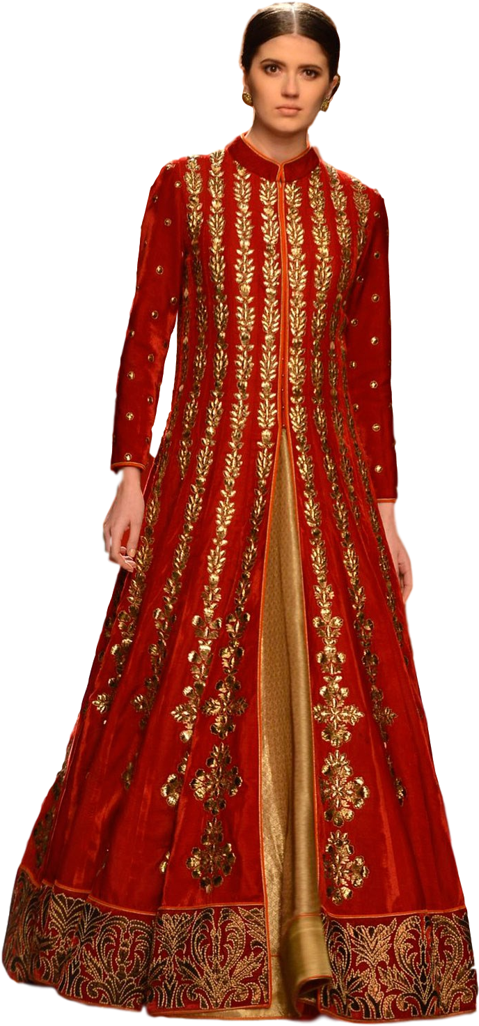 A Woman In A Red And Gold Dress