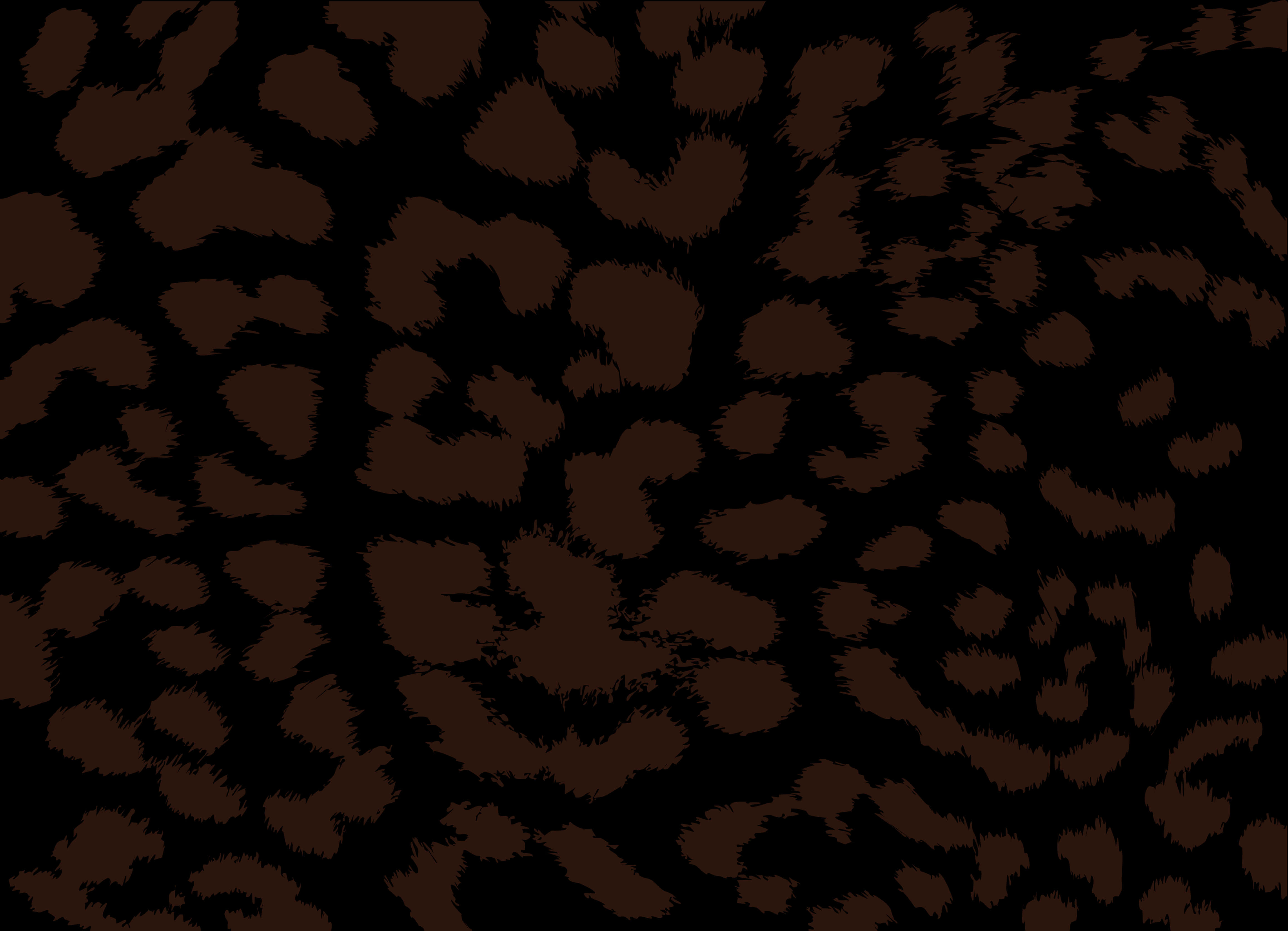 A Close Up Of A Black And Brown Spotted Animal Skin