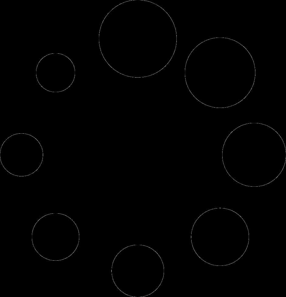 A Black Circle With White Dots
