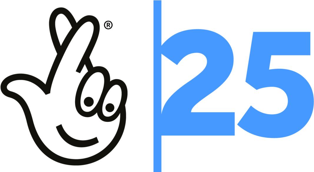 A White Hand With A Blue Number And A Black Background