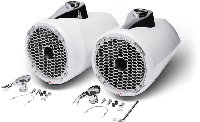A Pair Of White Speakers With Metal Mesh And Screws