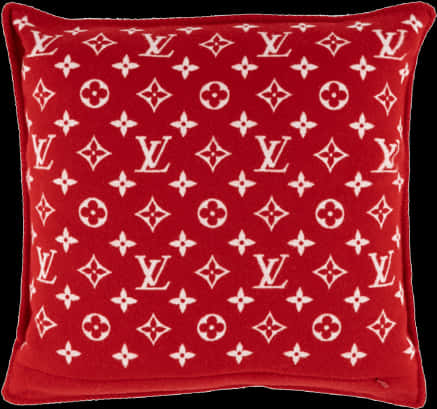 A Red Pillow With White Designs