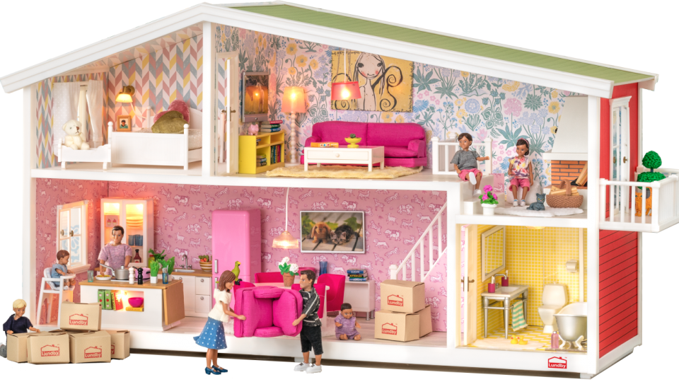 A Doll House With A Doll And A Couple Of People