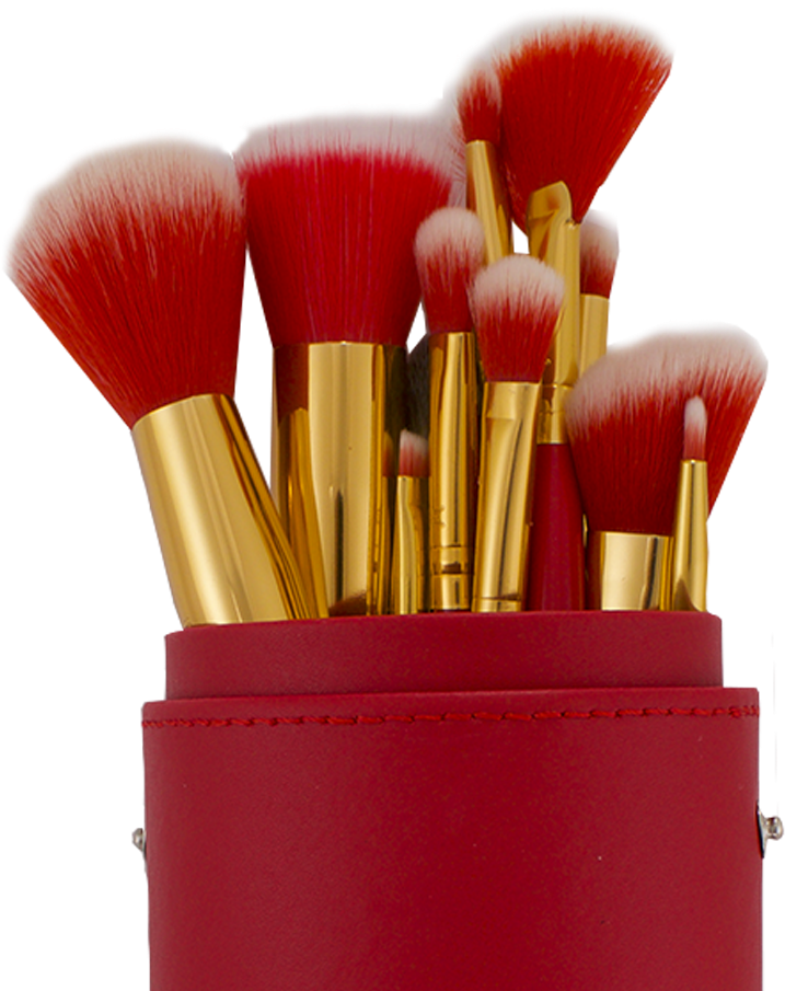 A Group Of Makeup Brushes In A Red Container
