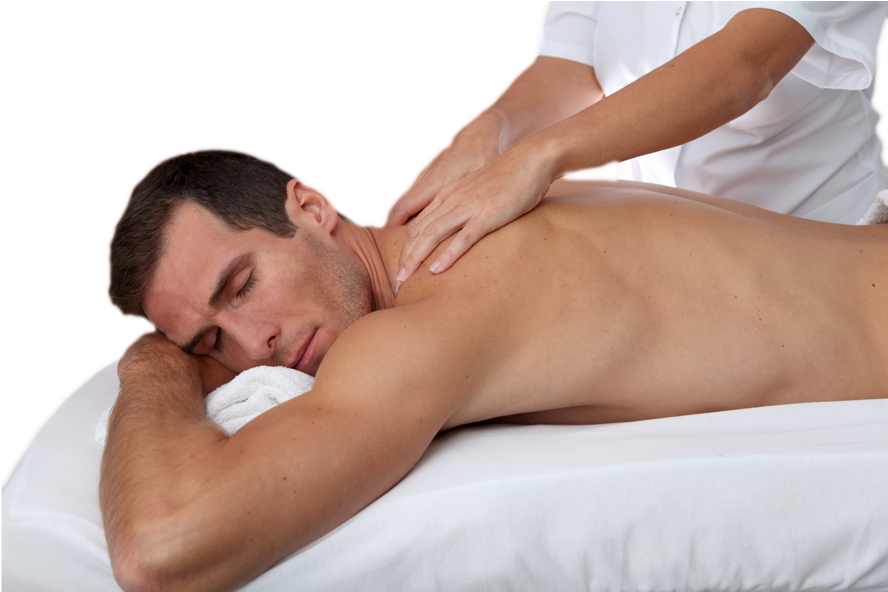 A Man Lying On A Massage Table