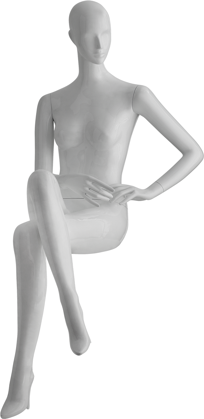 A White Mannequin Sitting On A Black Background