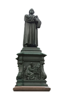 A Statue Of A Man With A Long Robe