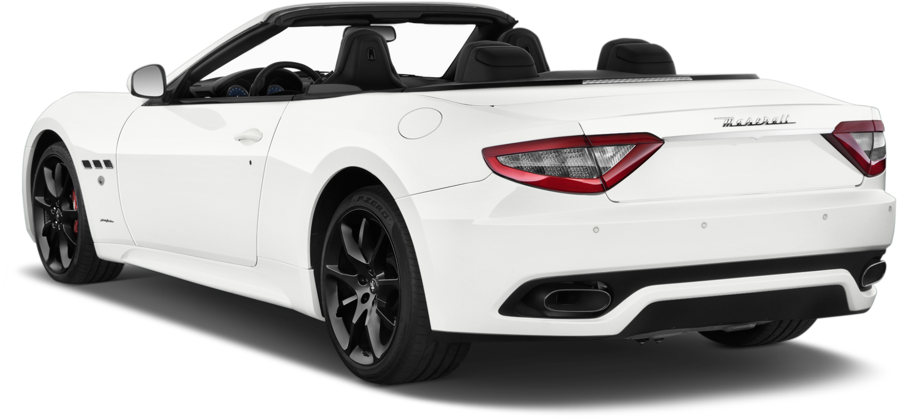 A White Convertible Car With Black Background