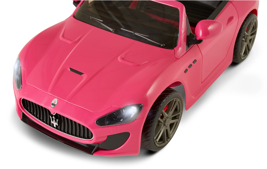 A Pink Toy Car With A Black Background