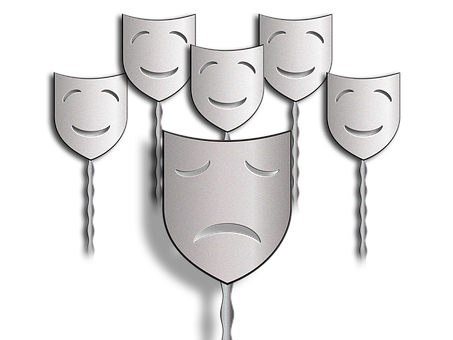 A Group Of Masks With Faces