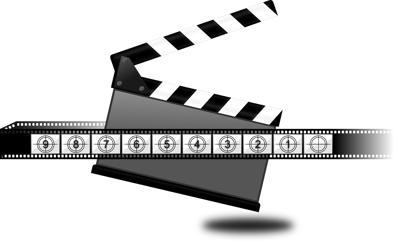A Movie Clapper Board And Film Strip
