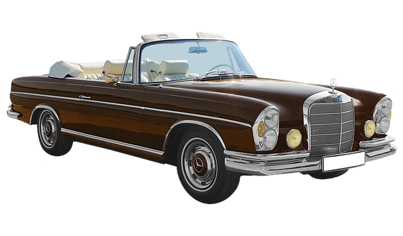 A Brown Convertible Car With White Leather Seats