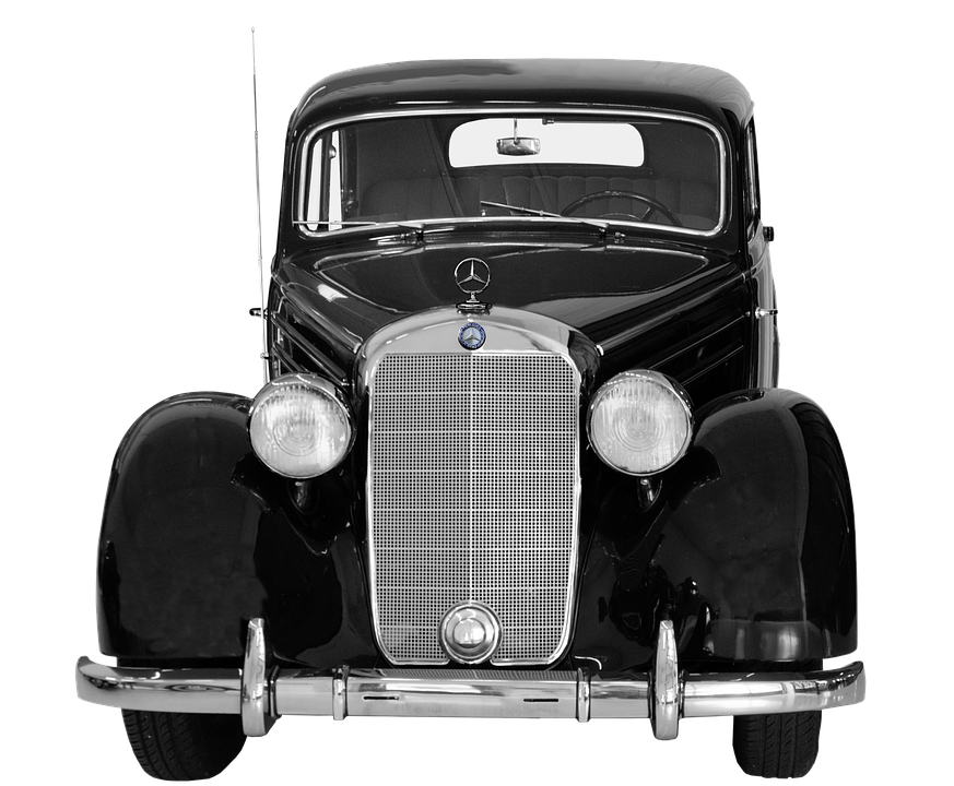 A Black And White Photo Of A Car