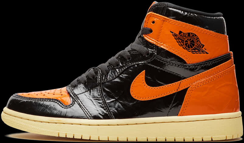 A Black And Orange Shoe