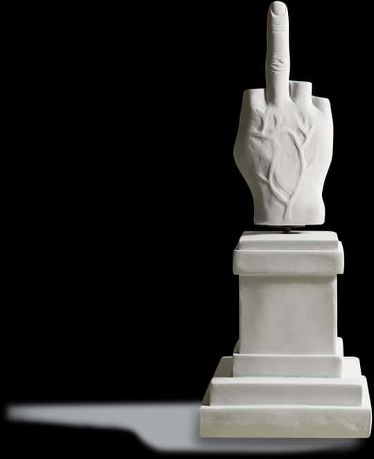 A Statue Of A Hand With A Finger Up