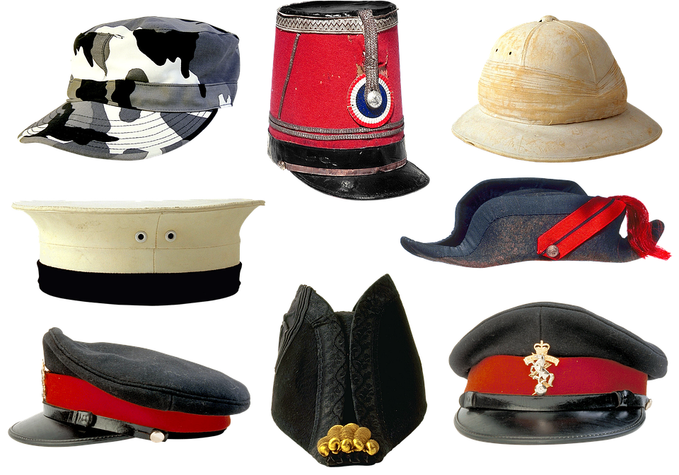 A Group Of Hats On A Black Background