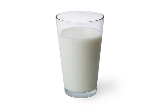 A Glass Of Milk On A Black Background